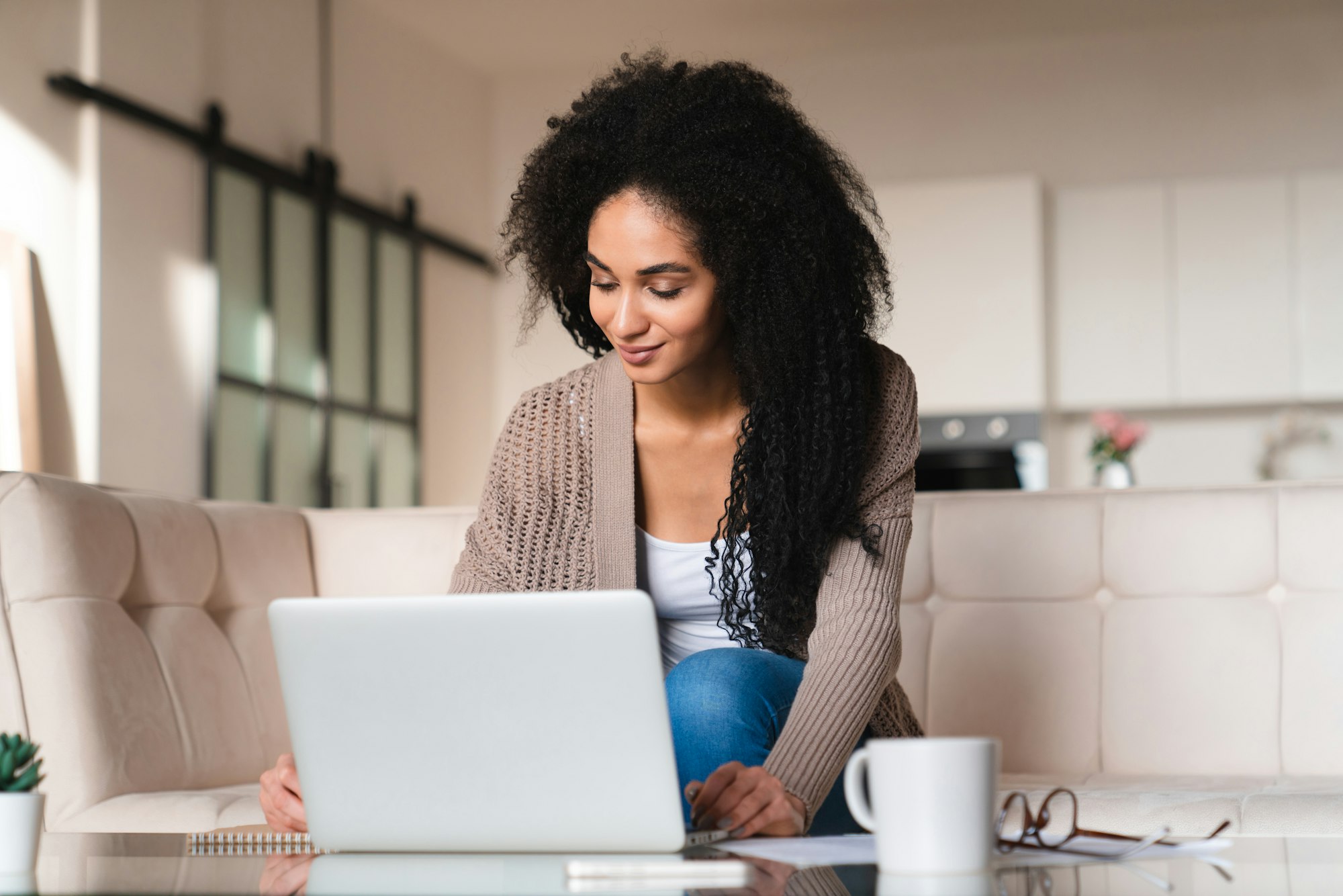 African young female businesswoman student freelancer learner teacher doing homework, e-learning