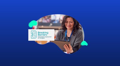 A woman smiles while looking at a tablet. The Breaking Barriers logo and tagline "Meaningful employment for refugees" appear beside her on a blue background.