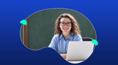 A person with curly hair, wearing glasses and a striped shirt, sits at a laptop against a blue and green abstract background.