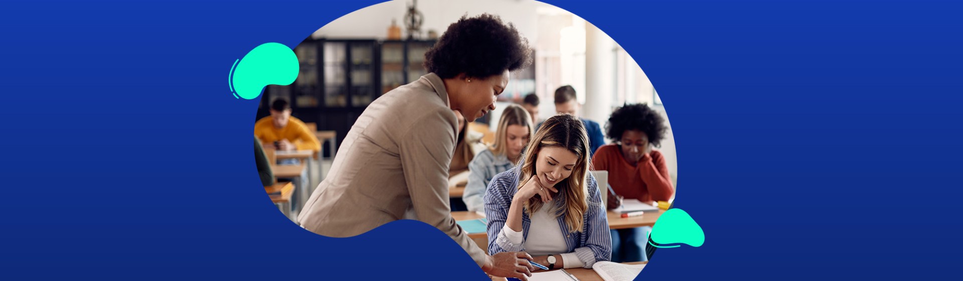 A teacher assists a smiling student with schoolwork in a classroom. Other students are focused on their tasks in the background. The image is set against a blue abstract shape.