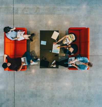 University students with books and laptop