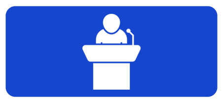 White icon of a person standing at a podium with a microphone on a blue rectangular background.